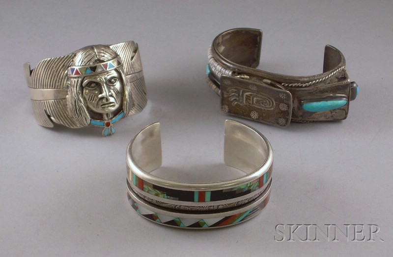 Appraisal: Three Southwest Bracelets all with inset stones one with image