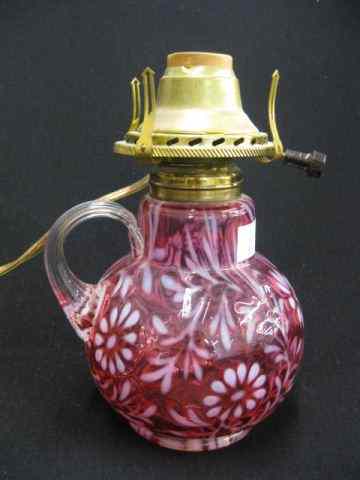 Appraisal: Cranberry Opalescent Glass Oil Lamp ''Spanish Moss'' pattern electrified