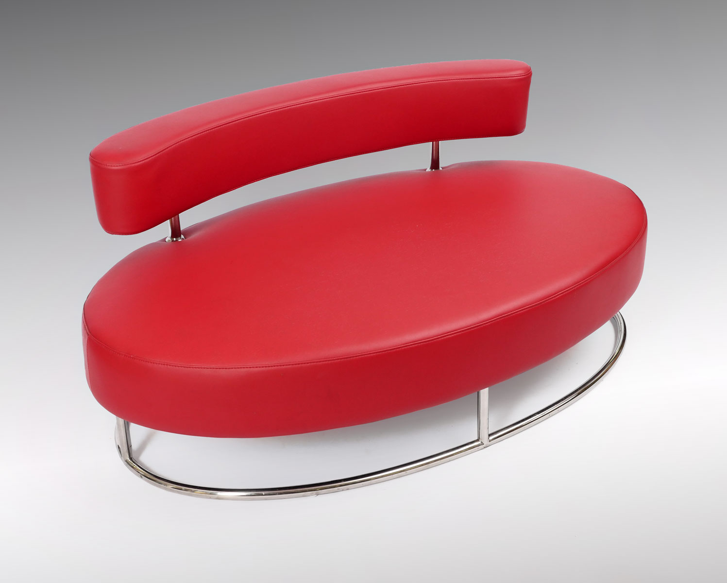 Appraisal: ZURI MODERNE CHAIR Mid-century style red oval sofa by Zuri