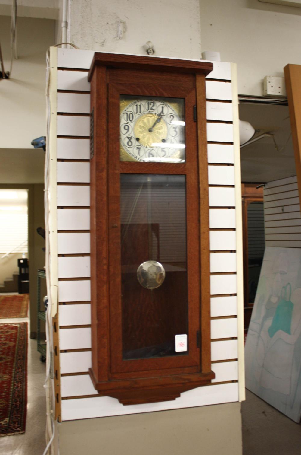 Appraisal: AN OAK LONGCASE WALL CLOCK William L Gilbert Clock Company