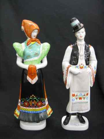 Appraisal: Pair of Hungarian Porcelain Figurinesof peasant man woman signed Hollohaza