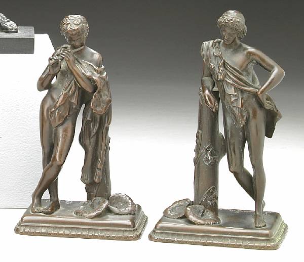 Appraisal: A pair of French patinated bronze figures of fauns after