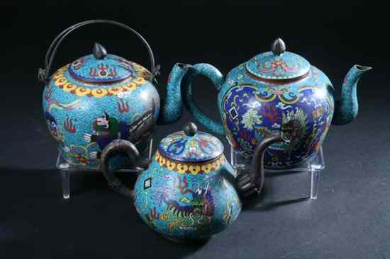 Appraisal: THREE CHINESE CLOISONN ENAMEL TEA POTS Late Qing Dynasty early