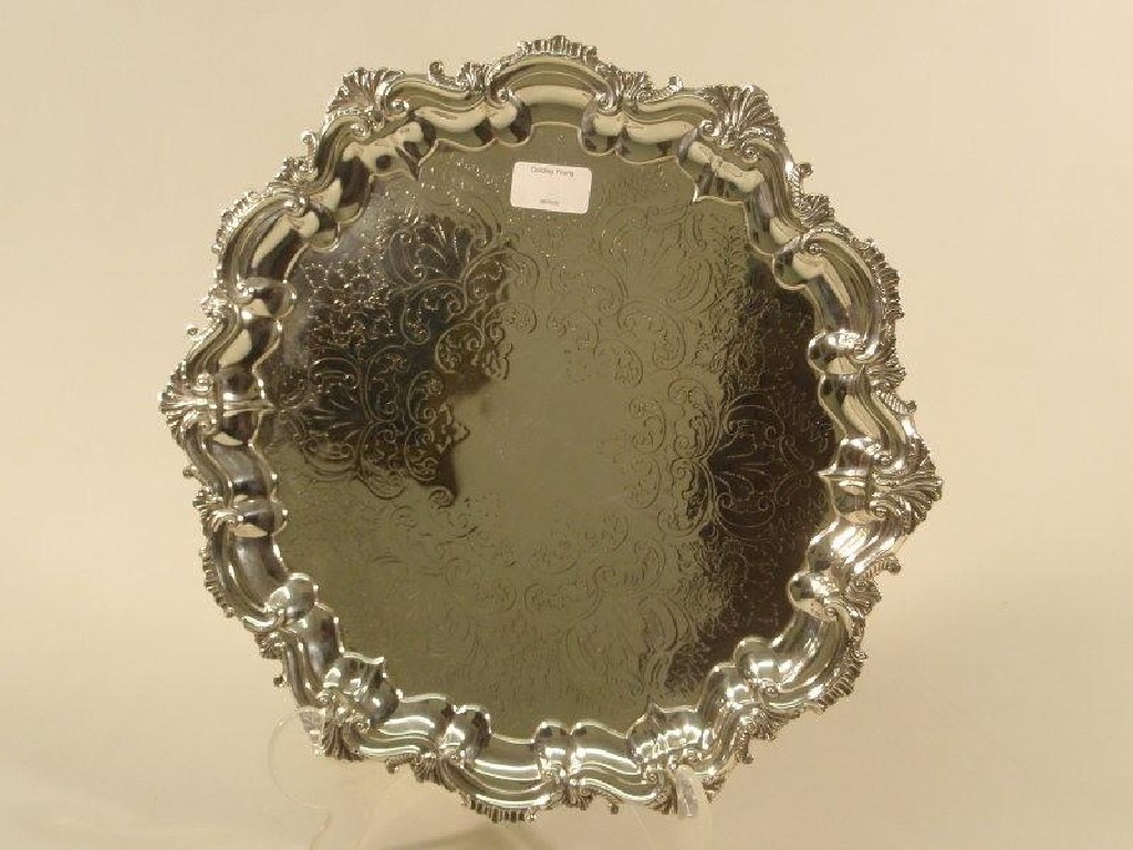 Appraisal: An early George V silver salver with a pie crust