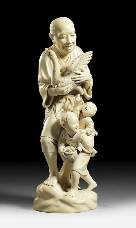 Appraisal: LARGE IVORY OKIMONO OF A PEASANT Japan Meiji-period H cm