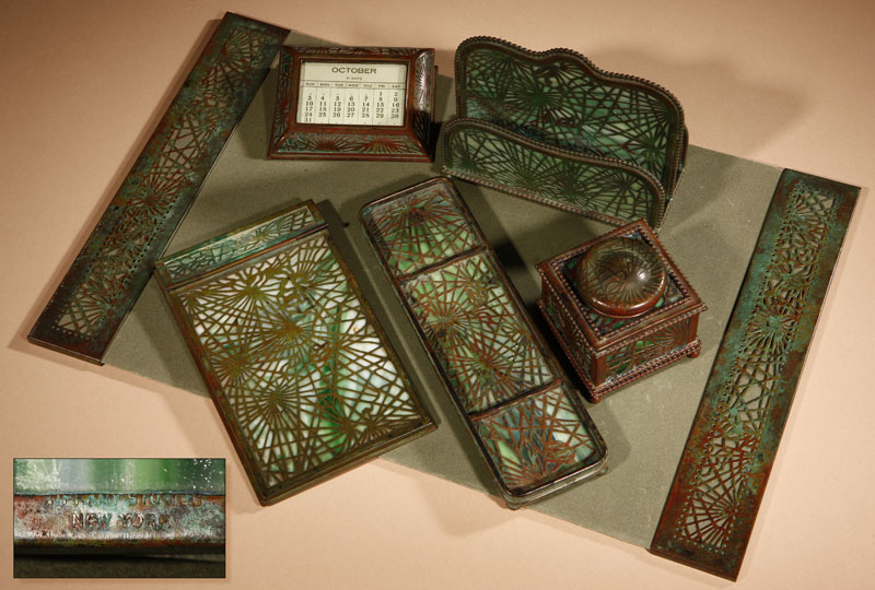 Appraisal: A Tiffany Studios bronze and glass 'Pine Needles' six-piece desk