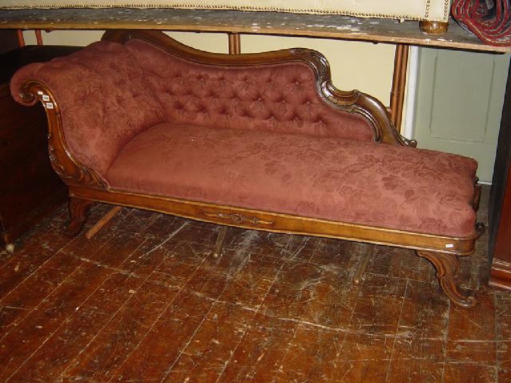 Appraisal: An early th century mahogany chaise longe with upholstered seat