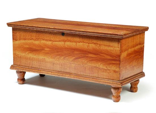 Appraisal: DECORATED MINIATURE BLANKET CHEST American - pine Dovetailed box with