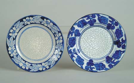 Appraisal: TWO DEDHAM POTTERY PLATES grape pattern on a white crackle