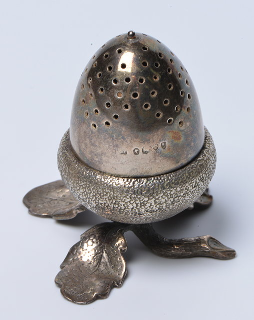 Appraisal: A SILVER PEPPERETTE IN THE FORM OF AN ACORN mark