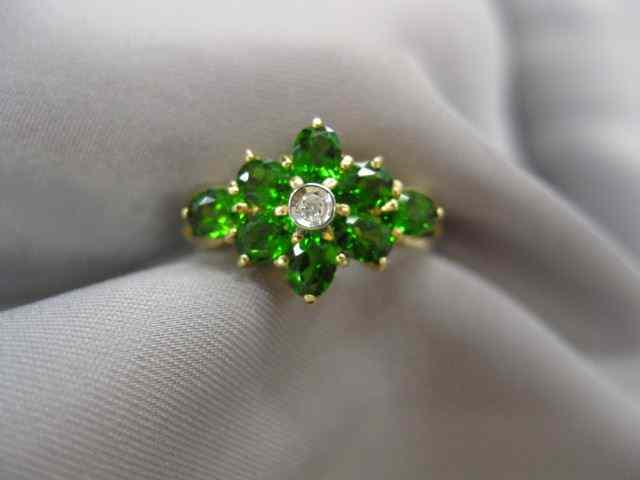 Appraisal: Tsavorite Garnet Diamond Ring rich green garnets and small diamonds