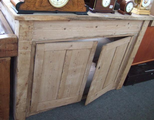 Appraisal: A large th century pine dresser base with a pair