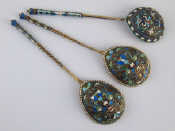 Appraisal: Three silver gilt Russian cloisonne enamelled spoons one Moscow one