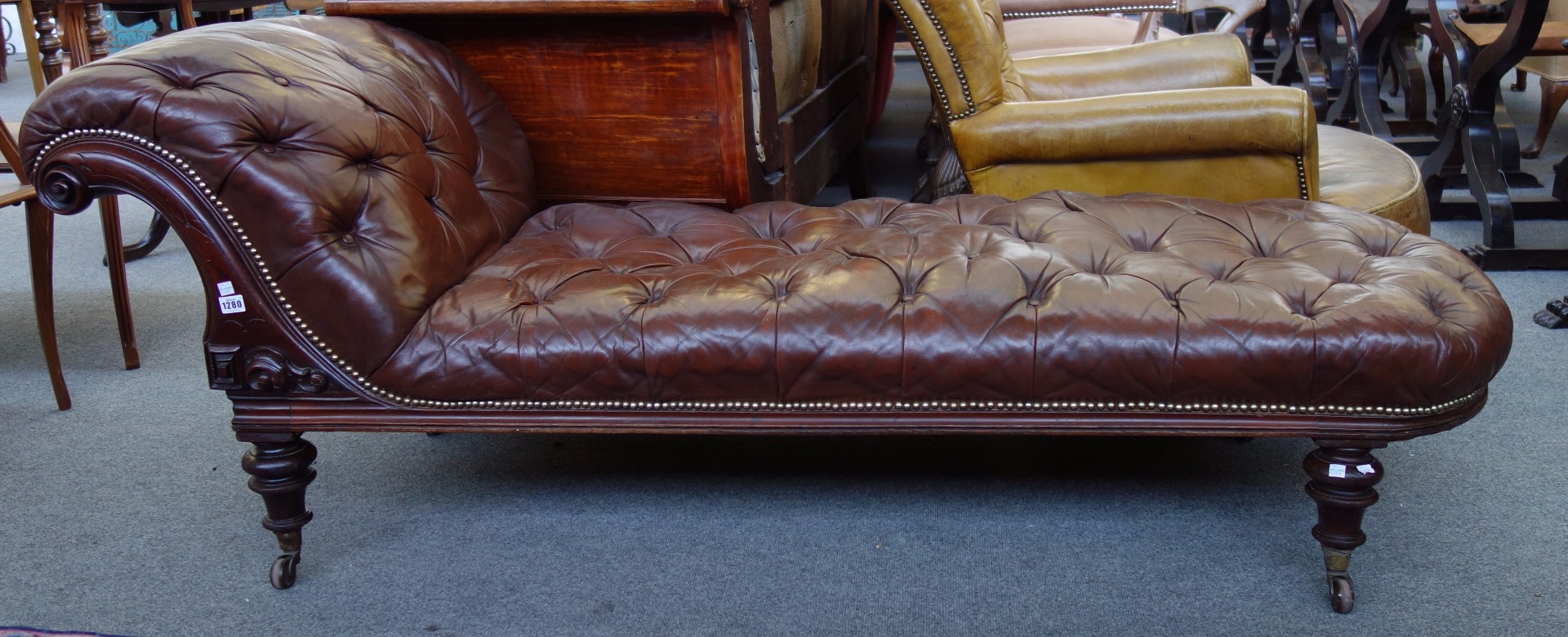 Appraisal: A mid th century mahogany framed day bed with later