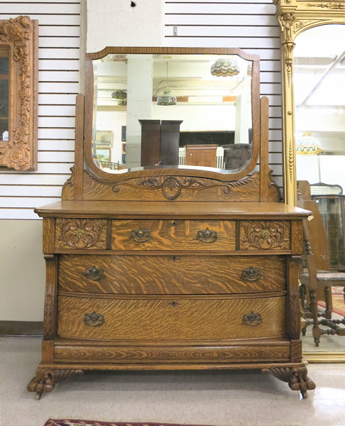 Appraisal: CARVED OAK DRESSER WITH ATTACHED TILT MIRROR The Karges Furniture