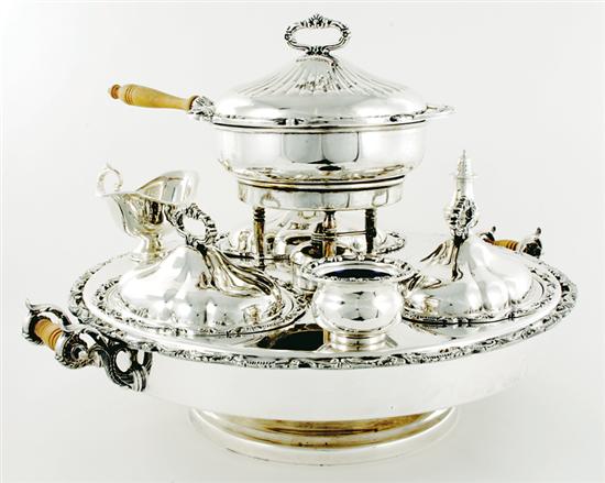 Appraisal: Unusual silverplate breakfast serving stand revolving stand with warming well