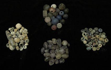 Appraisal: Assorted Roman Glass Beads Together with hardstone beads Provenance The