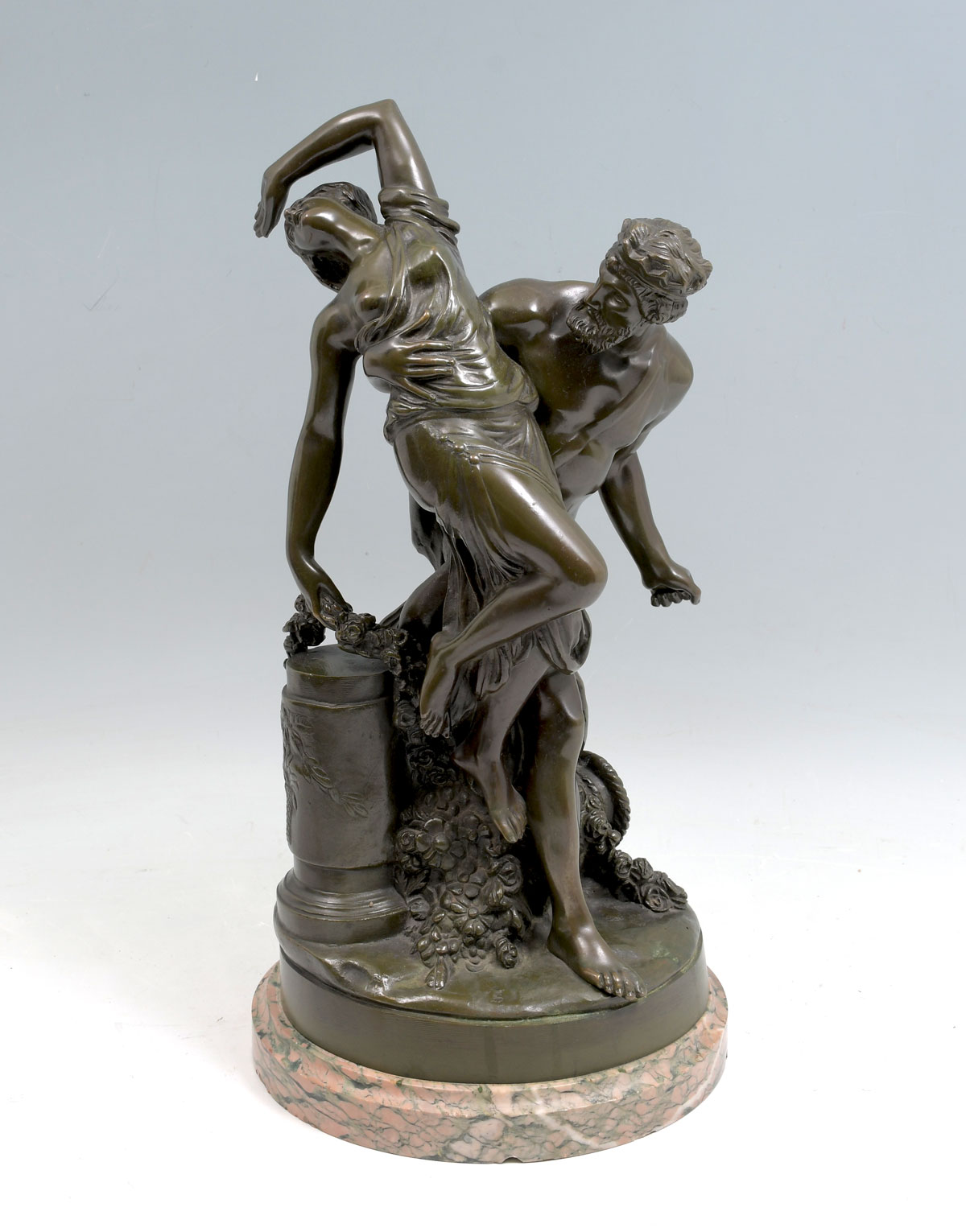 Appraisal: NEOCLASSICAL STYLE PATINATED BRONZE OF A MAN ESCAPING WITH A