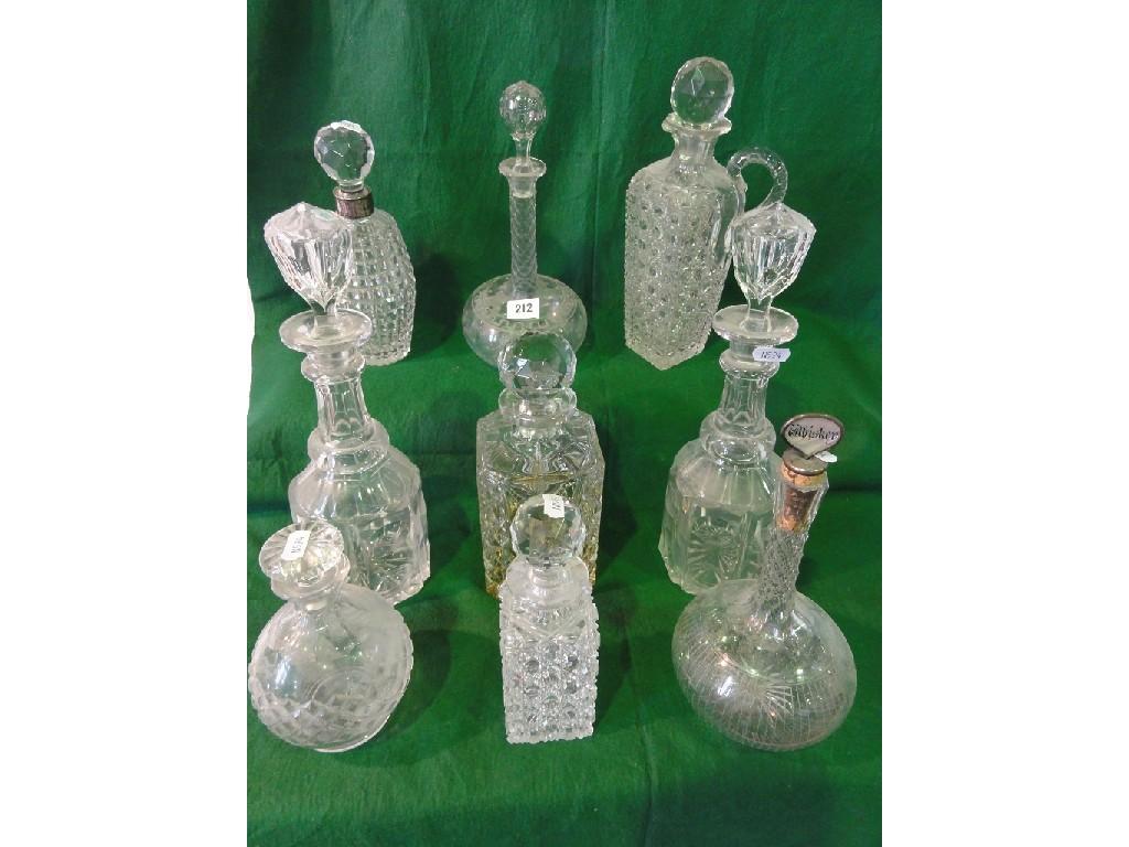 Appraisal: A collection of th century and other glass decanters and