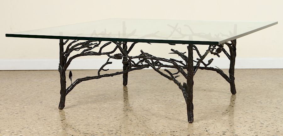 Appraisal: GLASS TOP COFFEE TABLE MANNER OF GIACOMETTI A black painted