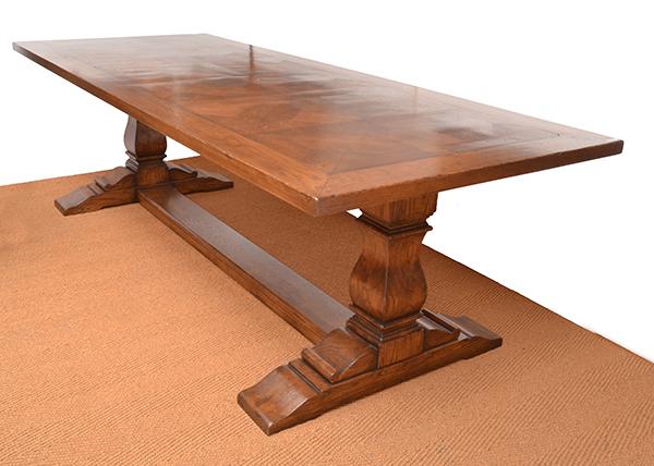 Appraisal: AN OAK REFECTORY TABLE the rectangular top with panelled inlay