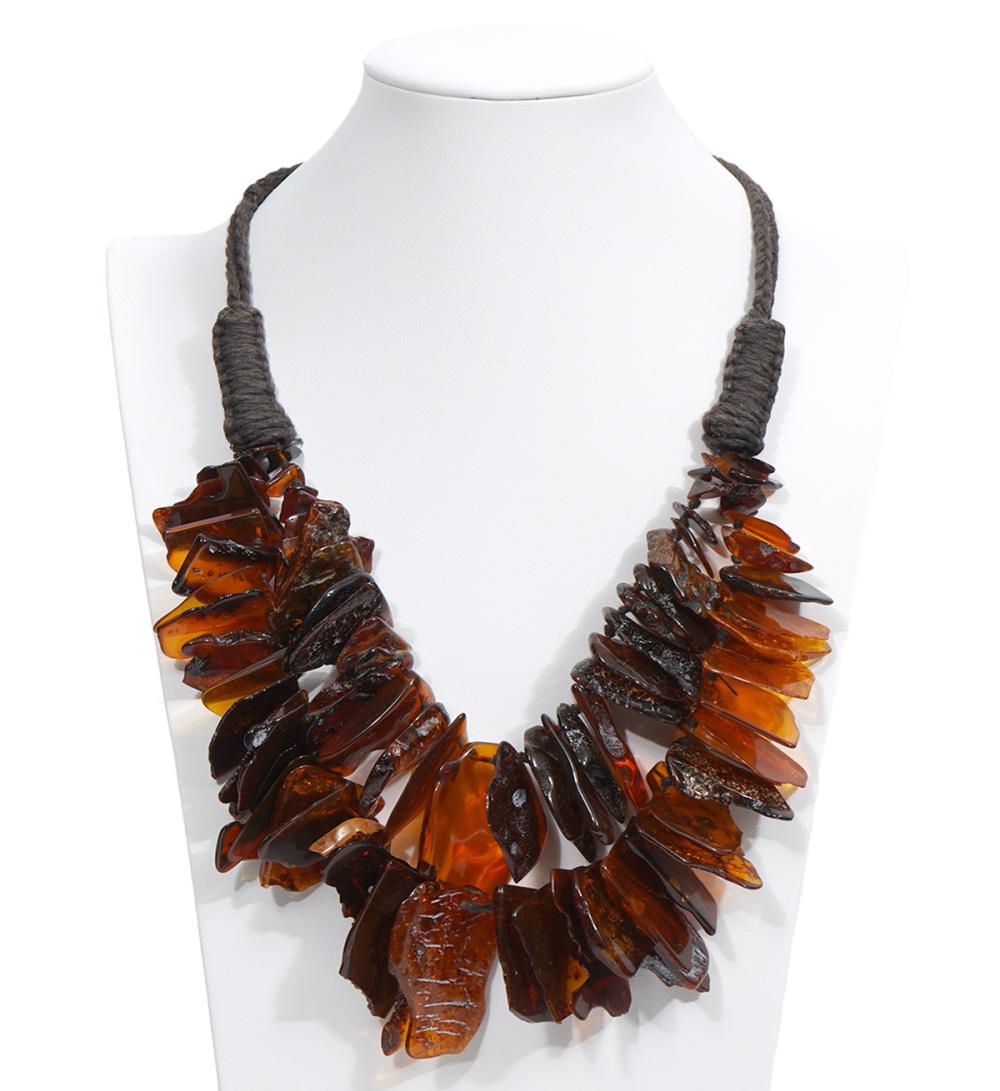 Appraisal: BOHEMIAN STYLE DOUBLE STRAND AMBER CORD NECKLACEBohemian style double strand