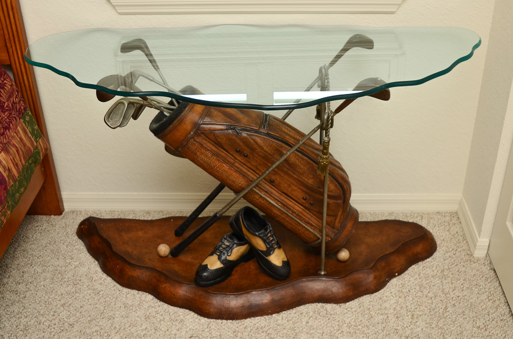 Appraisal: GOLFING MOTIF GLASS TOP TABLE Golf club bag and shoes