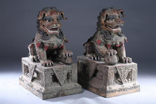 Appraisal: PAIR LARGE CHINESE POLYCHROME METAL FIGURES OF FU LIONS Each