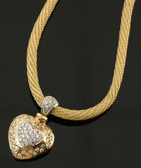 Appraisal: CT GOLD DIAMOND SET HEART PENDANT SUSPENDED FROM AN CT