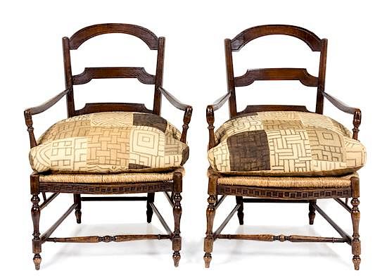 Appraisal: A Pair of Louis XIV Style Provincial Oak Ladder-Back Armchairs