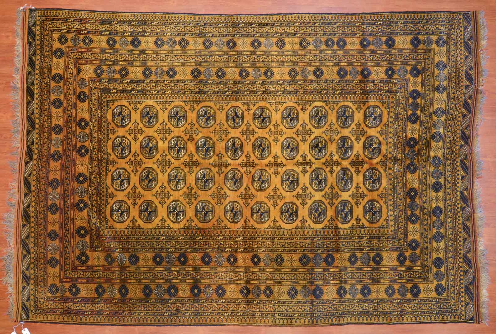 Appraisal: Golden Afghan rug approx x circa Condition Good condition