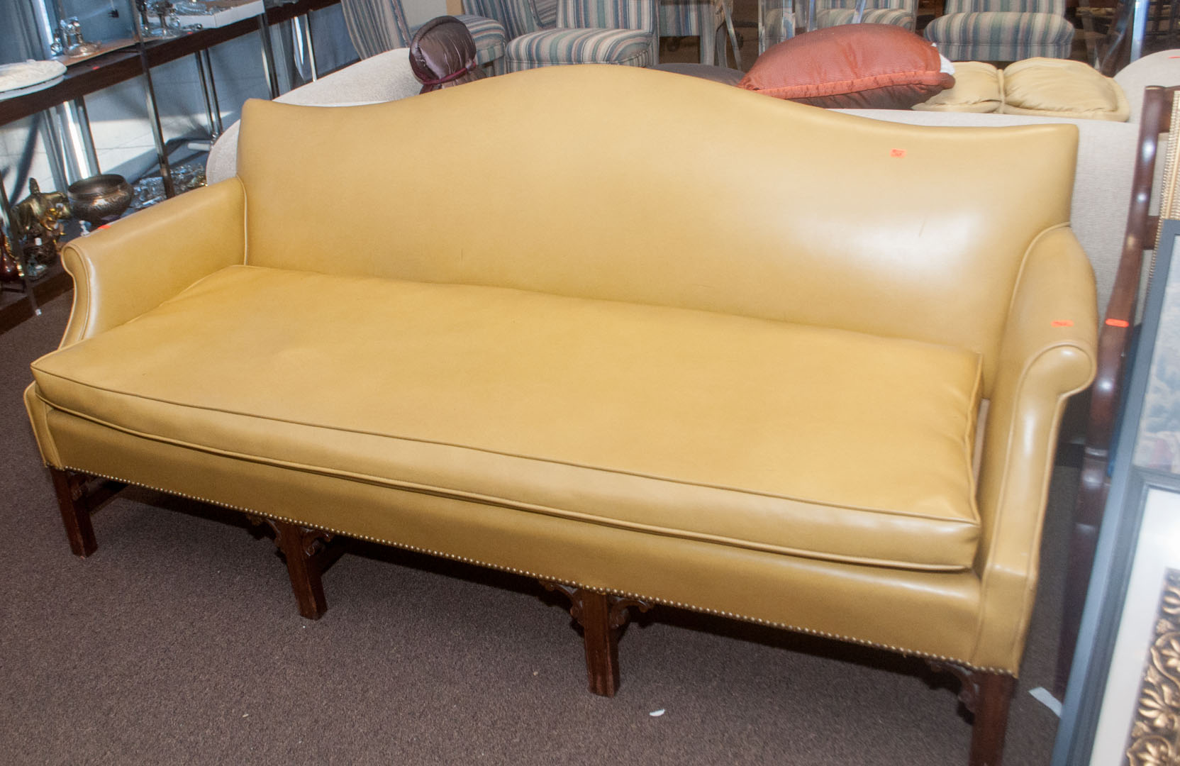 Appraisal: Vinyl upholstered camel-back sofa Undernumber