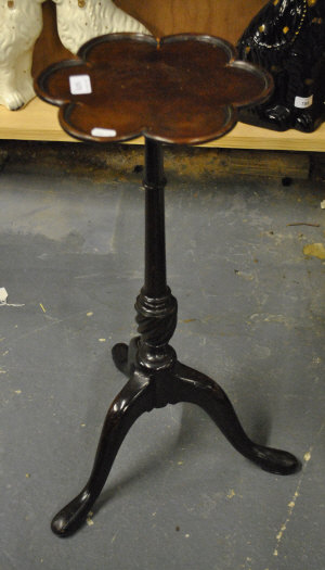 Appraisal: A th century mahogany wine table with lobed top on