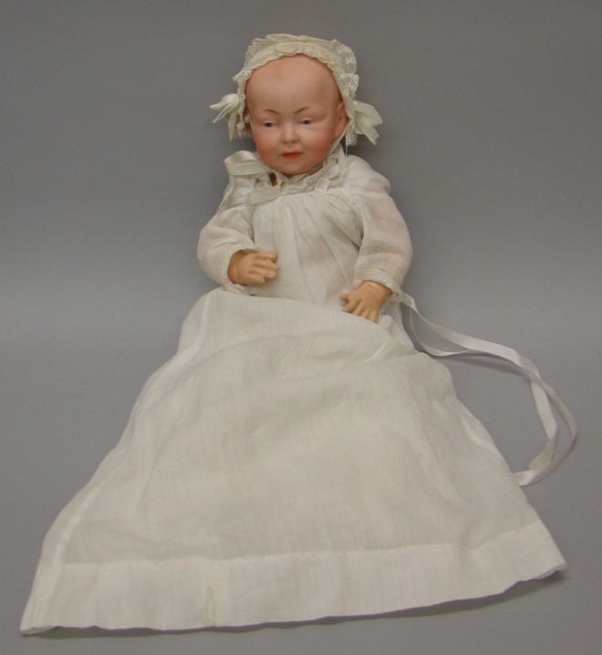 Appraisal: L cir Germany solid dome character baby with molded painted