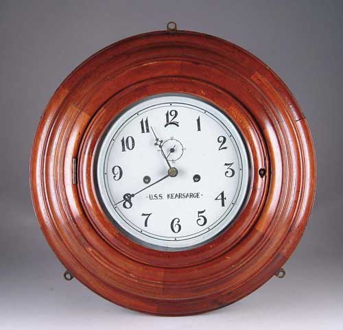 Appraisal: WOOD FRAMED SHIP S CLOCK White dial marked U S