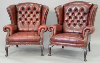 Appraisal: Pair of leather tufted wing chairs Pair of leather tufted