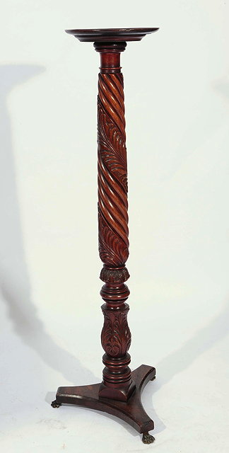 Appraisal: A VICTORIAN MAHOGANY TORCHERE of spiral column form on a