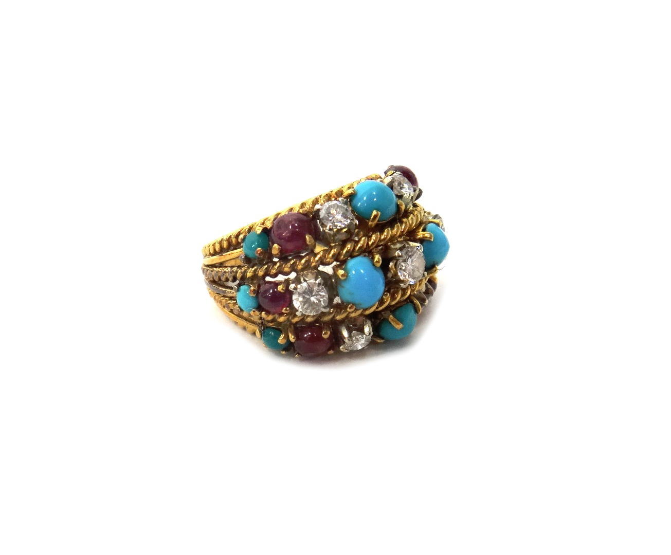 Appraisal: A gold diamond cabochon ruby and turquoise set ring in