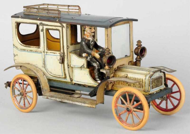 Appraisal: Tin Litho Carette Automobile Wind-Up Toy German Working Includes original