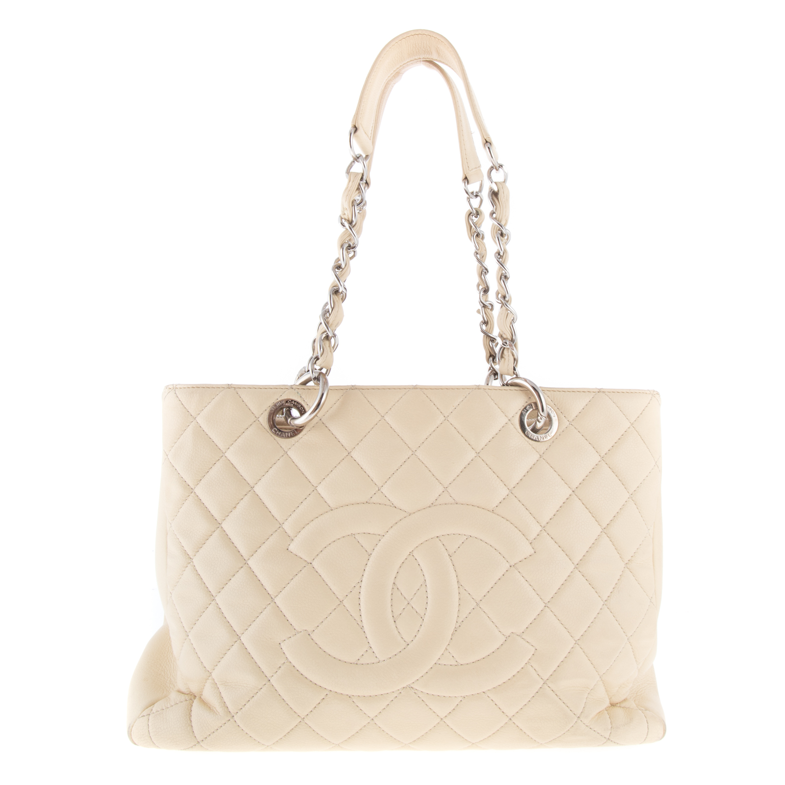 Appraisal: A CHANEL GRAND SHOPPING TOTE An ivory Caviar leather Chanel