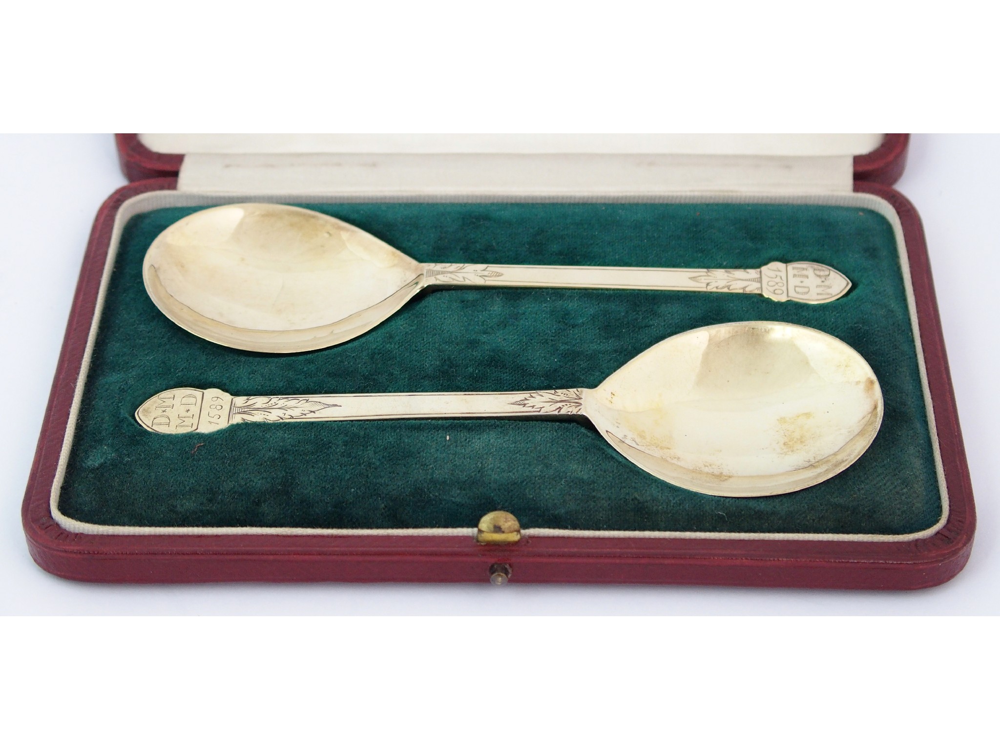 Appraisal: A cased pair of silver gilt serving spoonsby Wilson Sharp