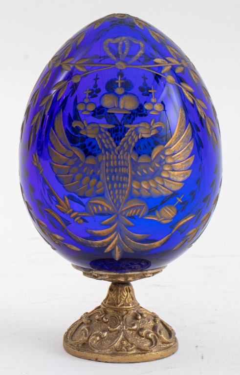 Appraisal: RUSSIAN GILDED COBALT GLASS EGG Russian parcel-gilded wheel-cut cobalt glass