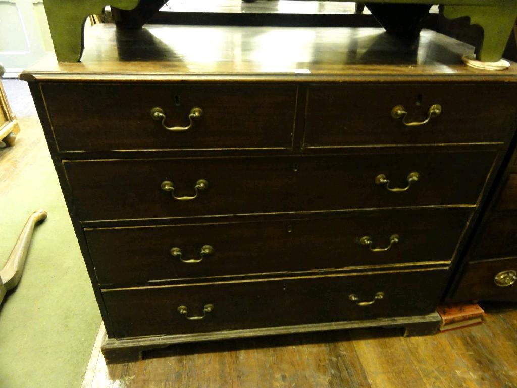 Appraisal: A Georgian mahogany chest fitted with three long and two