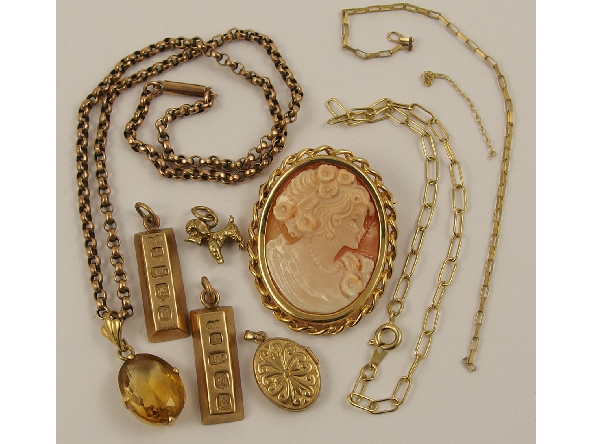 Appraisal: Two ct gold ingot pendants and a collection of gold