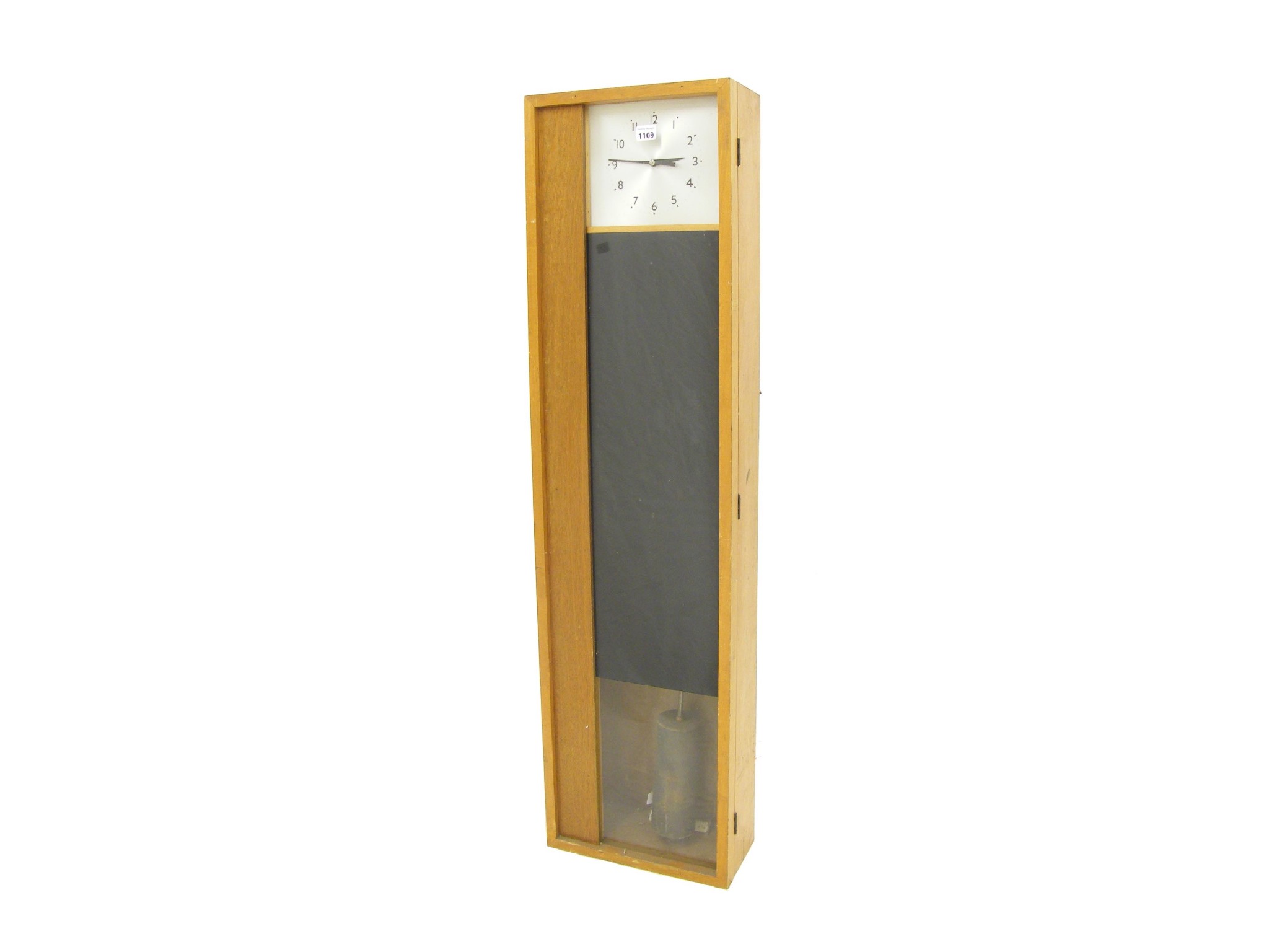 Appraisal: Contemporary light oak master clock the rectangular silvered dial within