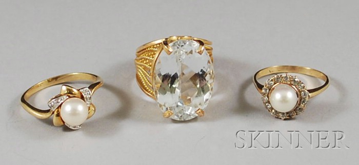 Appraisal: Three Gold Gem-set Rings two gold pearl and diamond rings