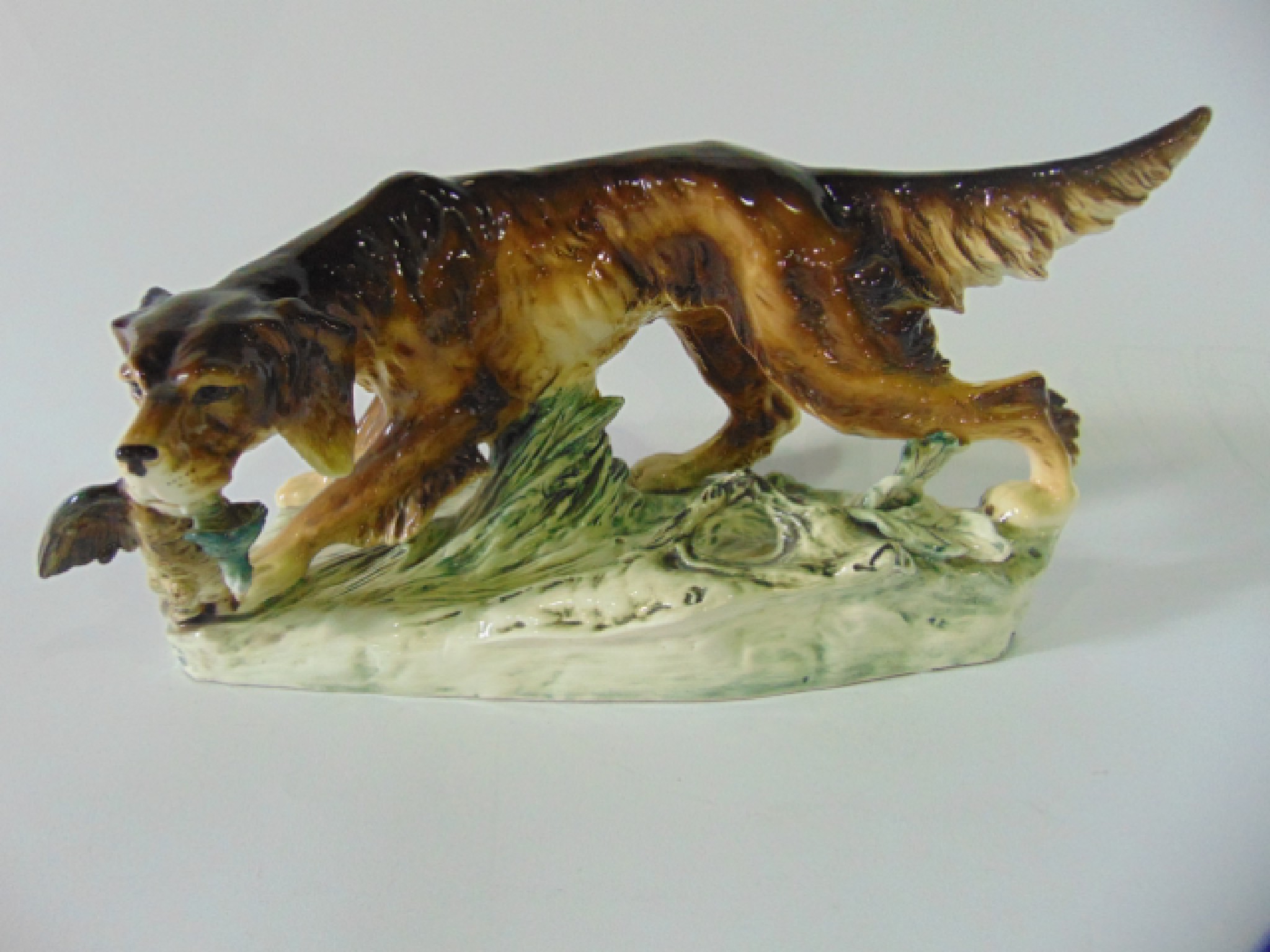 Appraisal: A large Czechoslovakian model of a setter dog with game