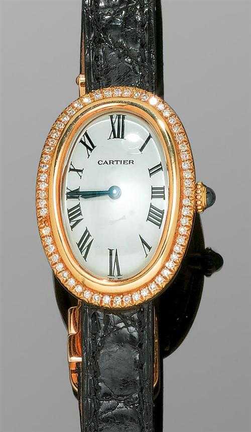 Appraisal: DIAMOND LADY'S WRISTWATCH CARTIER BAIGNOIRE Yellow gold Oval convex case