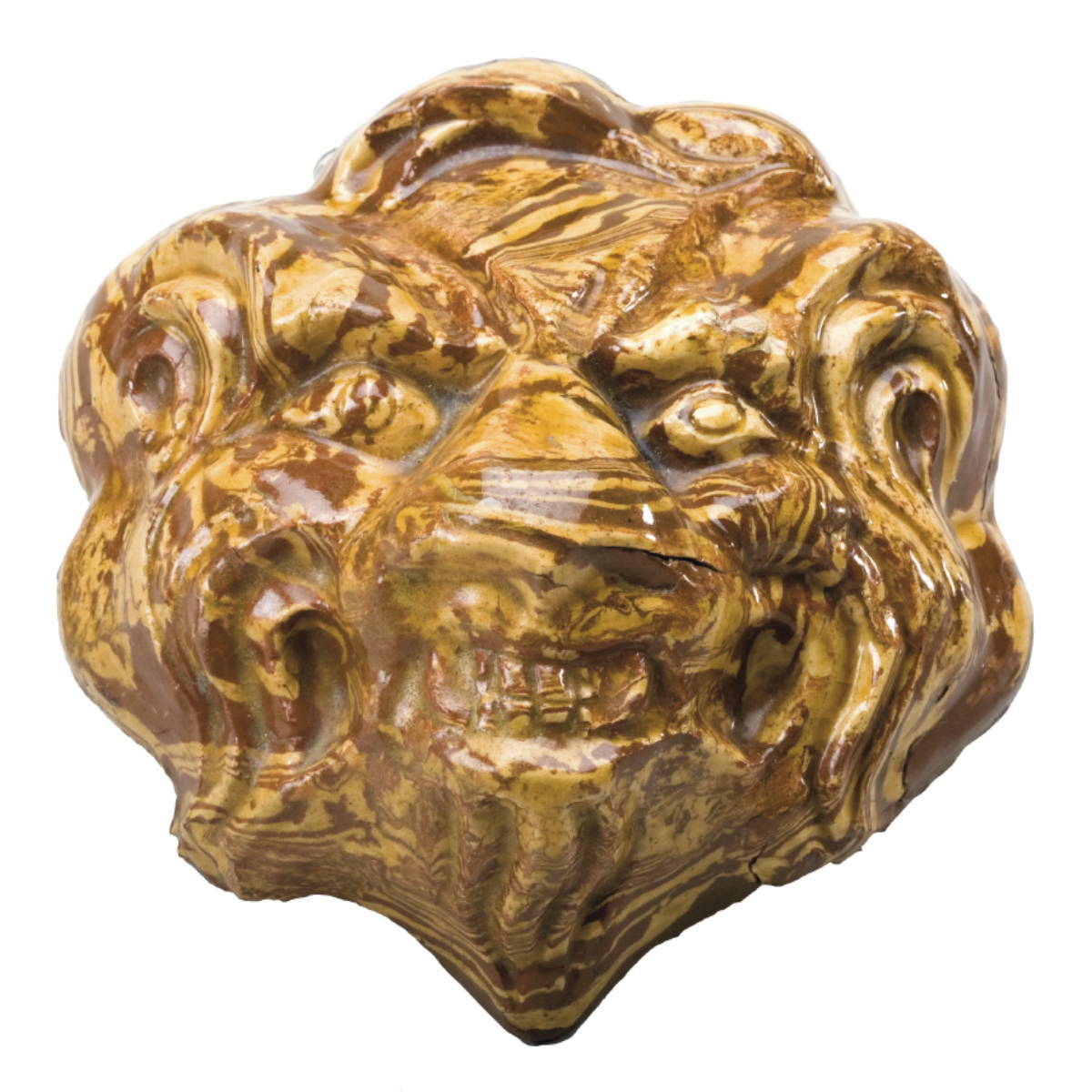 Appraisal: ENGLISH OR CONTINENTAL SOLID AGATE LION MASK Striated in yellow