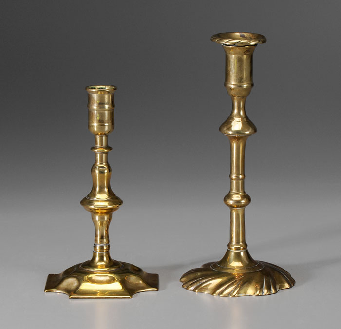 Appraisal: Two Brass Candlesticks English th century baluster shafts one with